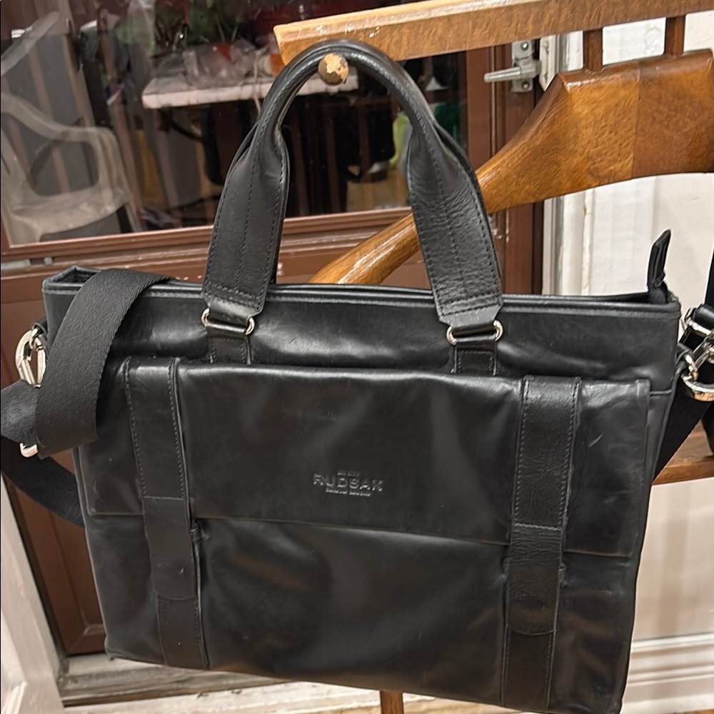 RUDSAK Black Leather Briefcase with Sleek Design